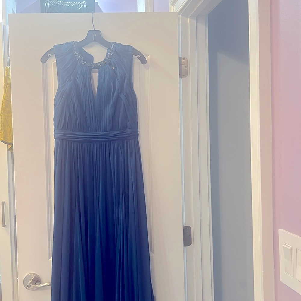 Sapphire floor length empire waist gown